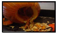 Gutting a pumpkin for carving